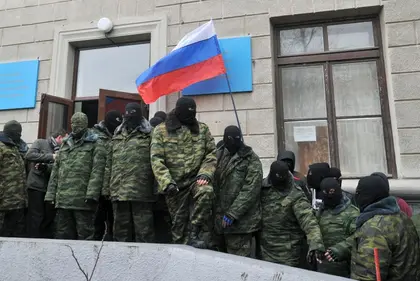Russian armed forces seize Crimea as Putin threatens wider military invasion of Ukraine