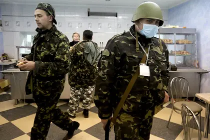 Armed pro-Russian insurgents in Luhansk say they are ready for police raid
