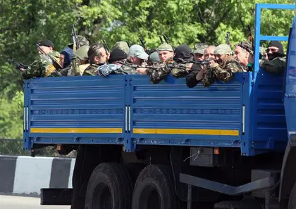 Ukrainian army battles Kremlin-backed separatists in Donetsk; at least one civilian killed in crossfire (LIVE UPDATES)
