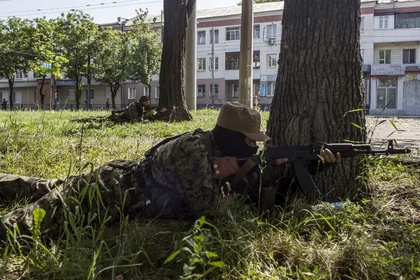 Separatist leader says six insurgents killed in attempt to collect bodies at Donetsk airport; military says they attacked