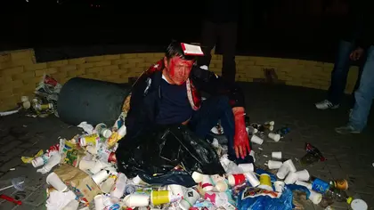 Frustrated over lack of justice, Ukrainians throw officials in trash (VIDEO)