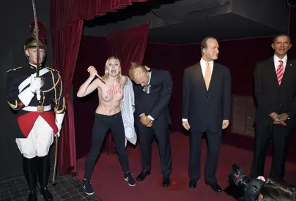 Reuters: Topless activist fined for exhibitionism in attack on Putin wax figure