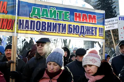 Ukraine’s 2015 budget proposal stirs fresh protests