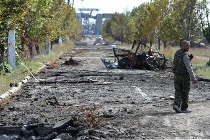 Rebel’s killing spurs war between Luhansk insurgent groups