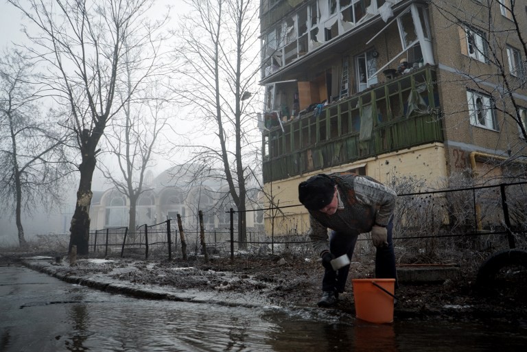 Quieter, but guns of war still not silent, on first day of cease-fire in Donetsk