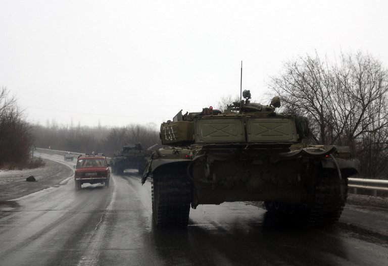 Kremlin-backed fighters gain more ground, build forces for attack on Mariupol