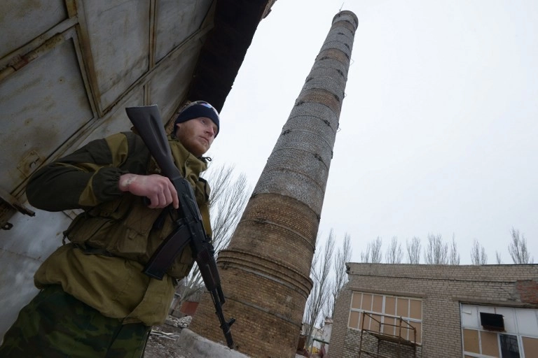 A year after fighting stops, depressed Yenakiyeve waits for recovery under Russian occupation