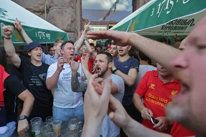 The Mirror: Masked Ukraine hooligans film themselves moments before attacking Liverpool fans