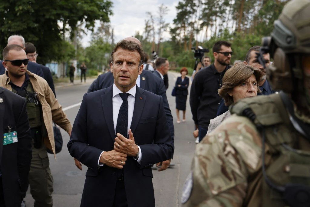 In war-damaged Irpin, Macron praises Ukrainian ‘heroism’