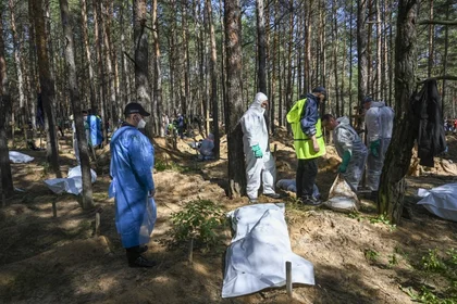 Ukraine Says 447 Bodies Exhumed at Izyum, 30 with “Signs of Torture”