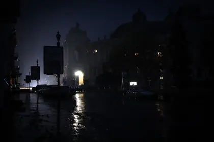 Watch Entire Towerblocks of Kyiv Residents Cheer When Power Turns On