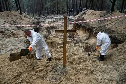 Victims of Rape, Castration Found During Exhumation in Liberated Izyum