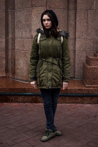 Student Olga Patsuk, 17, poses in Kyiv on November 8, 2022, amid the Russian military invasion of Ukraine. &#8211; &#8220;National influencer&#8221; Ukrainian President Volodymyr Zelensky set the trend by wearing khaki outfits in every setting since the beginning of the Russian invasion in February. In the eight months of war, his people followed suit. (Photo by Dimitar DILKOFF / AFP)