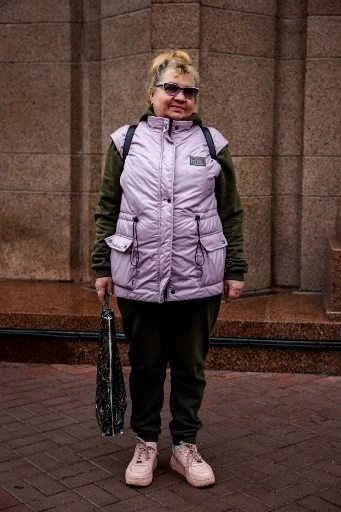 Pensioner Svetlana, 62, poses in Kyiv on November 8, 2022, amid the Russian military invasion of Ukraine. &#8211; &#8220;National influencer&#8221; Ukrainian President Volodymyr Zelensky set the trend by wearing khaki outfits in every setting since the beginning of the Russian invasion in February. In the eight months of war, his people followed suit. (Photo by Dimitar DILKOFF / AFP)