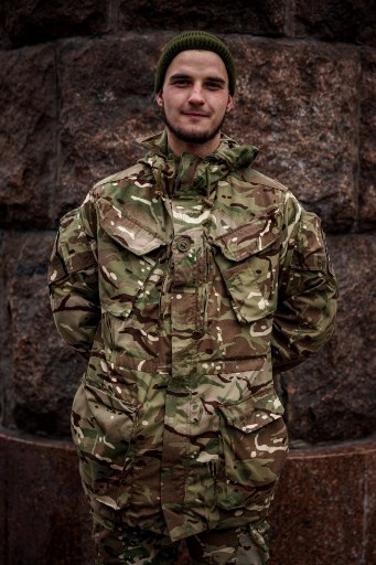 Yvhen, 21, a military, poses in Kyiv on November 8, 2022, amid the Russian military invasion of Ukraine. &#8211; &#8220;National influencer&#8221; Ukrainian President Volodymyr Zelensky set the trend by wearing khaki outfits in every setting since the beginning of the Russian invasion in February. In the eight months of war, his people followed suit. (Photo by Dimitar DILKOFF / AFP)