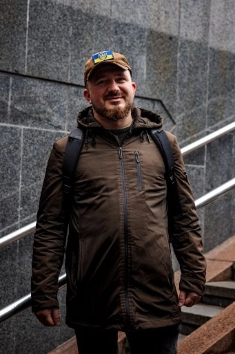 Volodymyr Veretenikov, 34, poses in Kyiv on November 8, 2022, amid the Russian military invasion of Ukraine. &#8211; &#8220;National influencer&#8221; Ukrainian President Volodymyr Zelensky set the trend by wearing khaki outfits in every setting since the beginning of the Russian invasion in February. In the eight months of war, his people followed suit. (Photo by Dimitar DILKOFF / AFP)