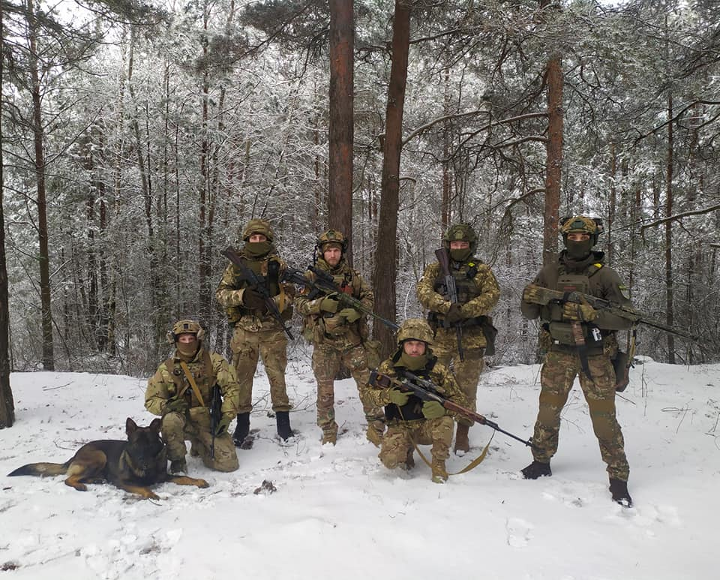 Volunteers from the 100th Separate Brigade of Territorial Defense take a break from winter training in a Volyn region forest on Nov. 24. Were Russia and Belarus to invade western Ukraine, Armed Forces of Ukraine units would try to use ambush tactics, fighters told Kyiv Post. Photo courtesy Armed Forces of Ukraine. 
Volunteers from the 100th Separate Brigade of Territorial Defense take a break from winter training in a Volyn region forest on Nov. 24. Were Russia and Belarus to invade western Ukraine, Armed Forces of Ukraine units would try to use ambush tactics, fighters told Kyiv Post. Photo courtesy Armed Forces of Ukraine.