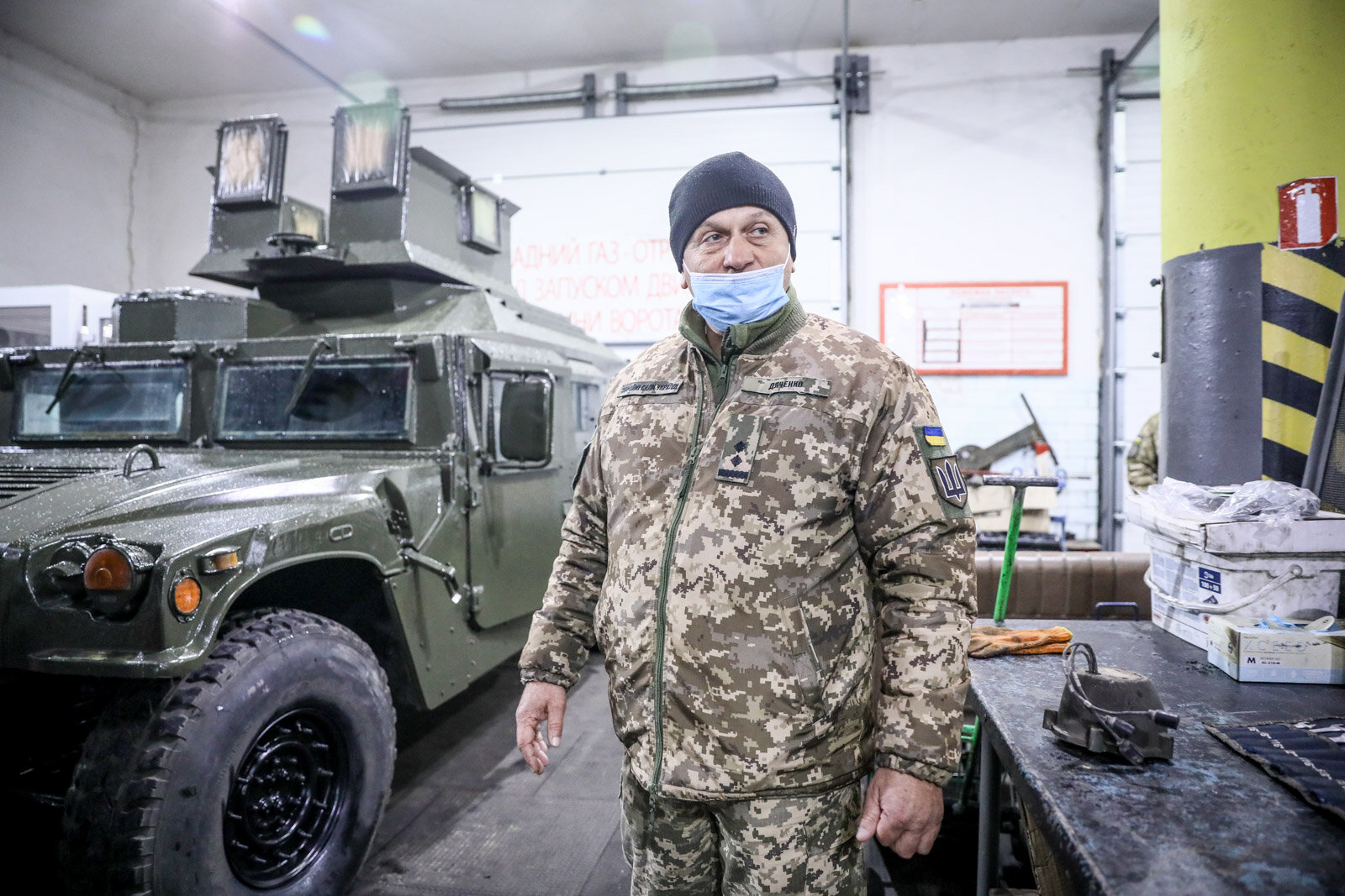 Lieutenant Colonel Yuriy Dyachenko inspects a utility vehicle  repair workshop in the city of Zhytomyr on Nov. 20, 2020.
