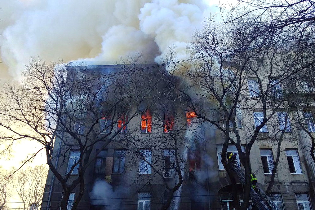 The building located at the intersection of Pushkinska and Troyitska streets burns in central Odesa on Dec. 4, 2019.