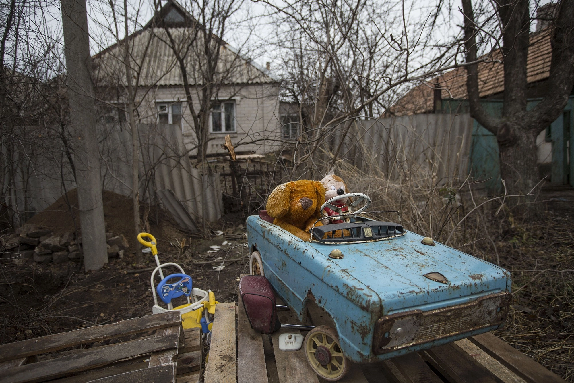 Toys sitting in a toy car as seen at the checkpoint in Verkhniotoretske, Donetsk Oblast on Nov. 29,2016.