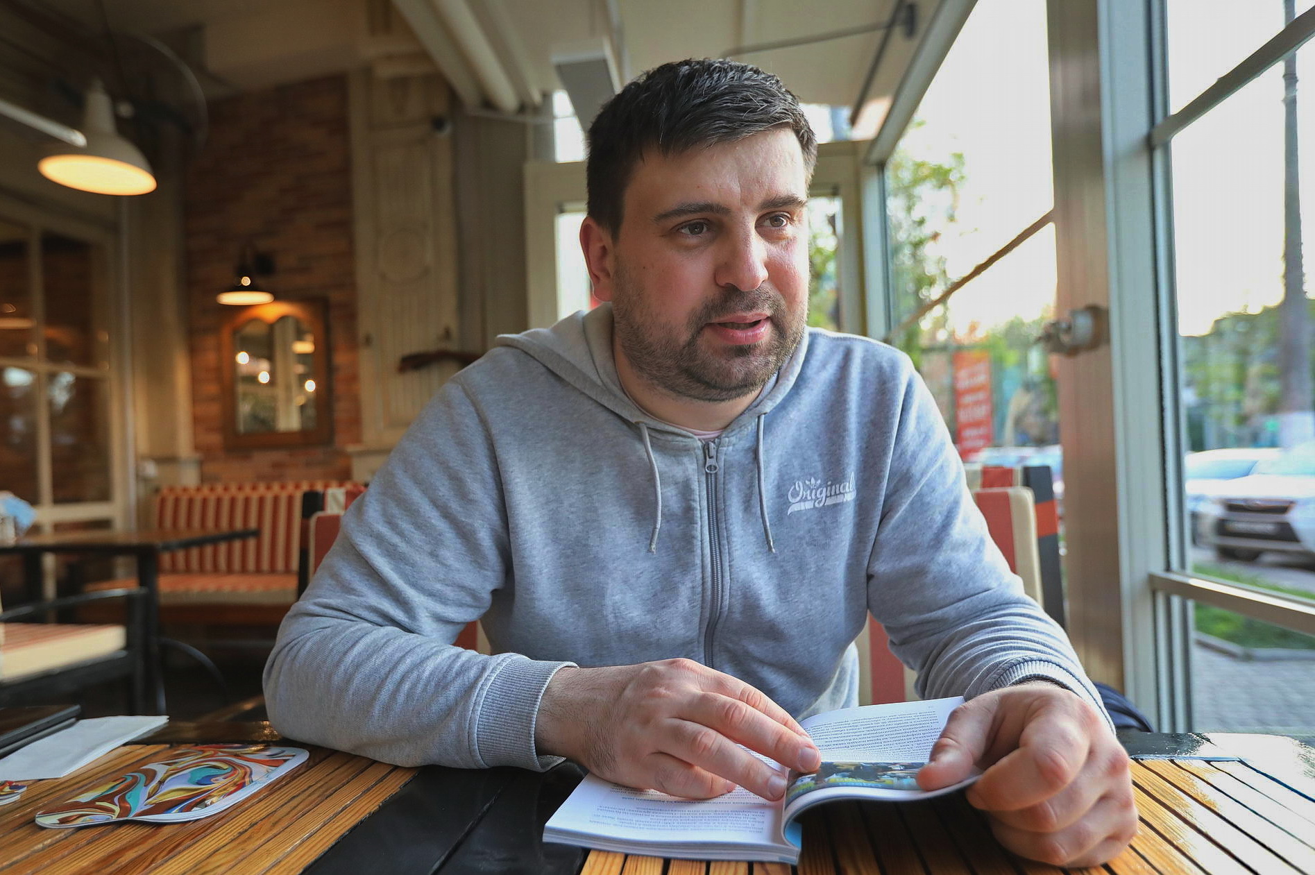 Pavlo Polamarchuk, an activist and contributor to the investigation of May 2 Group, talks in a cafe in Odesa on May 9, 2019. The experts of May 2 Group gave answers to many questions about the Odesa tragedy on May 2, 2014.