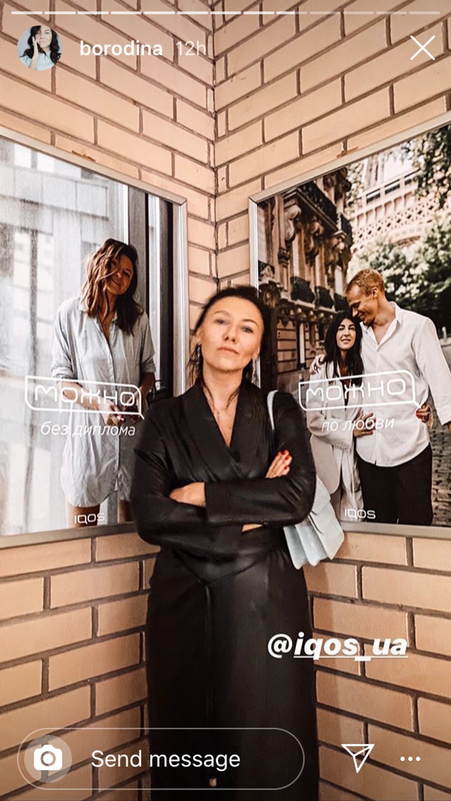 Valeria Borodina poses in front of a poster that features her promoting IQOS. This picture was taken at the &#8220;secret party&#8221; organized by IQOS in Kyiv on Feb. 14, 2020 to celebrate Valentine&#8217;s Day.