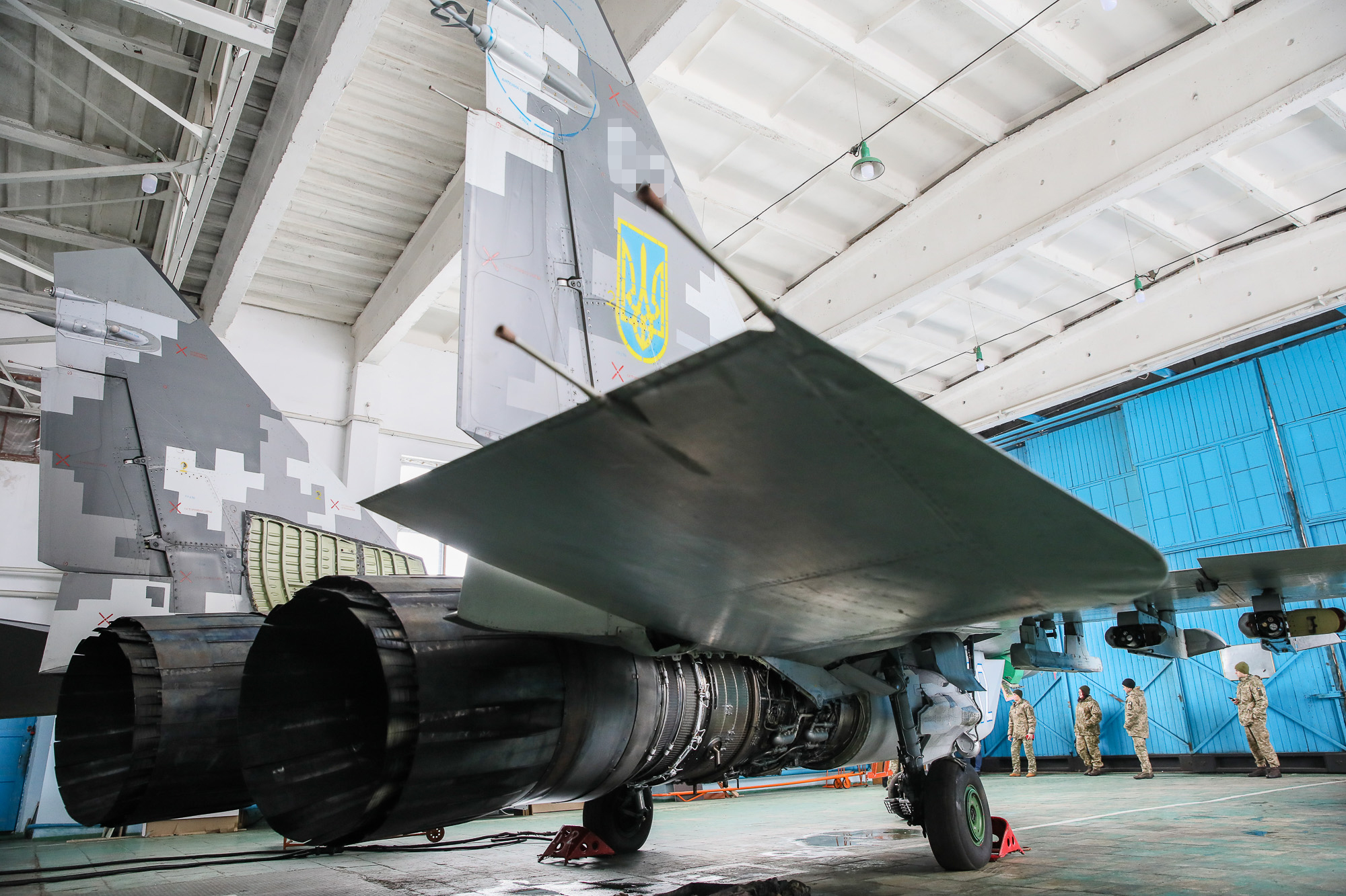 Repair technicians inspect a Ukrainian Air Force&#8217;s Mikoyan MiG-29 fighter at an airbase of Vasylkiv on Feb. 14, 2019.