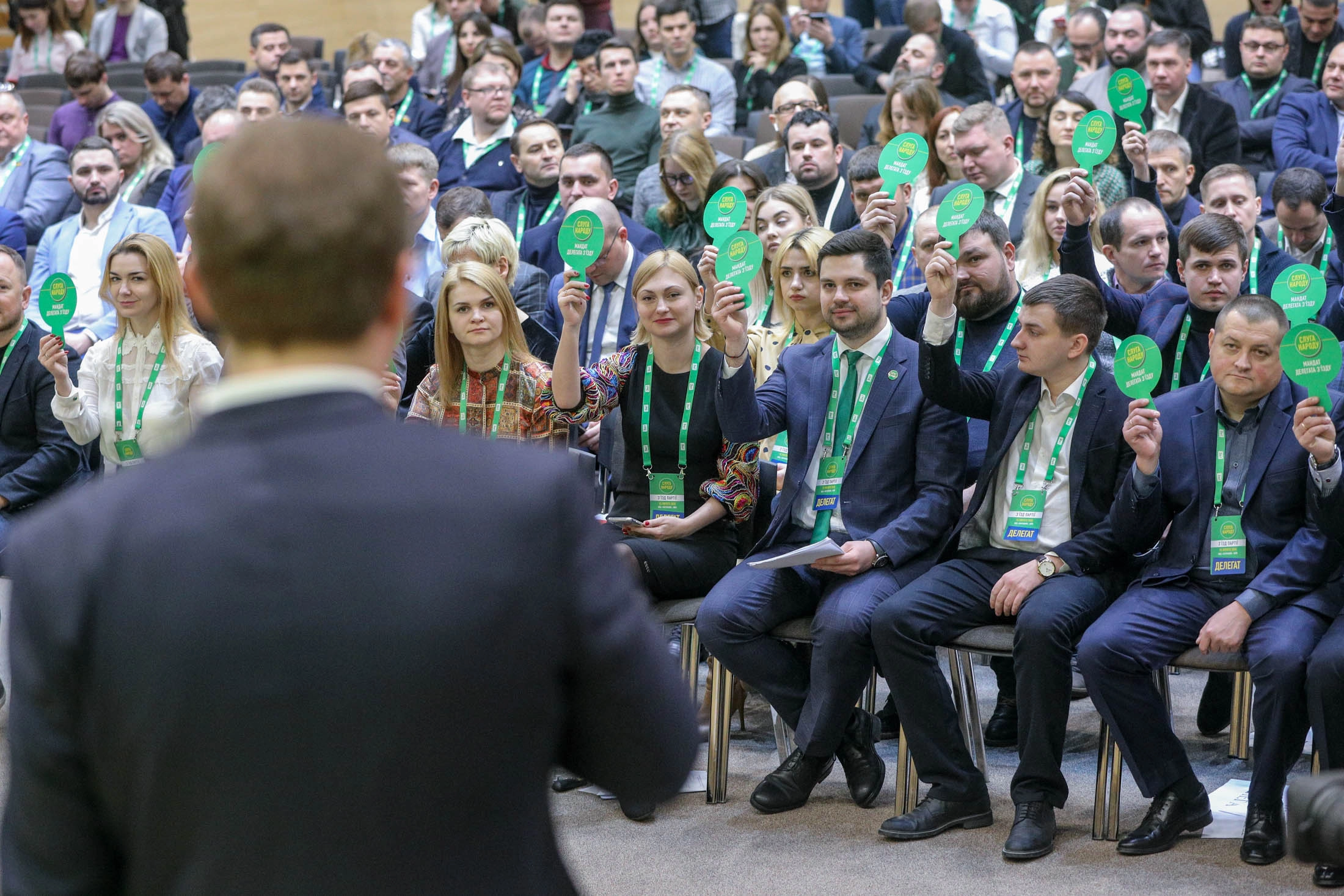 Oleksandr Korniyenko, deputy head of Servant of the People, delivers a speech onstage during the party&#8217;s convention in Kyiv on Feb. 15, 2020.