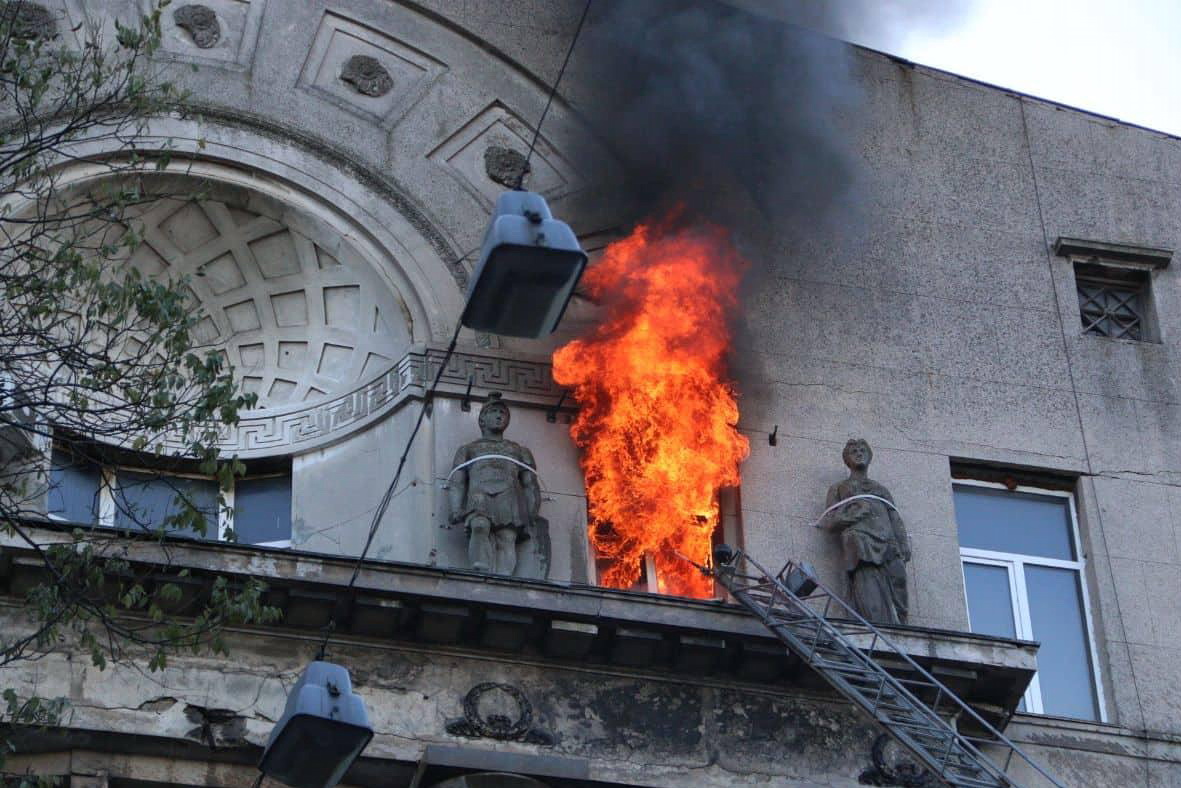 Flames burst out of the top floor of the college building located at the intersection of Pushkinska and Troyitska streets in central Odesa on Dec. 4, 2019.