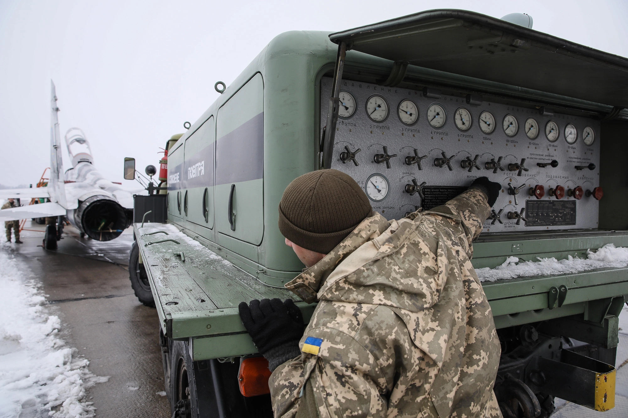 A service technician fuels a Ukrianian Air Force&#8217;s Mikoyan MiG-29 at an airbase of Vasylkiv on Feb. 14, 2019.