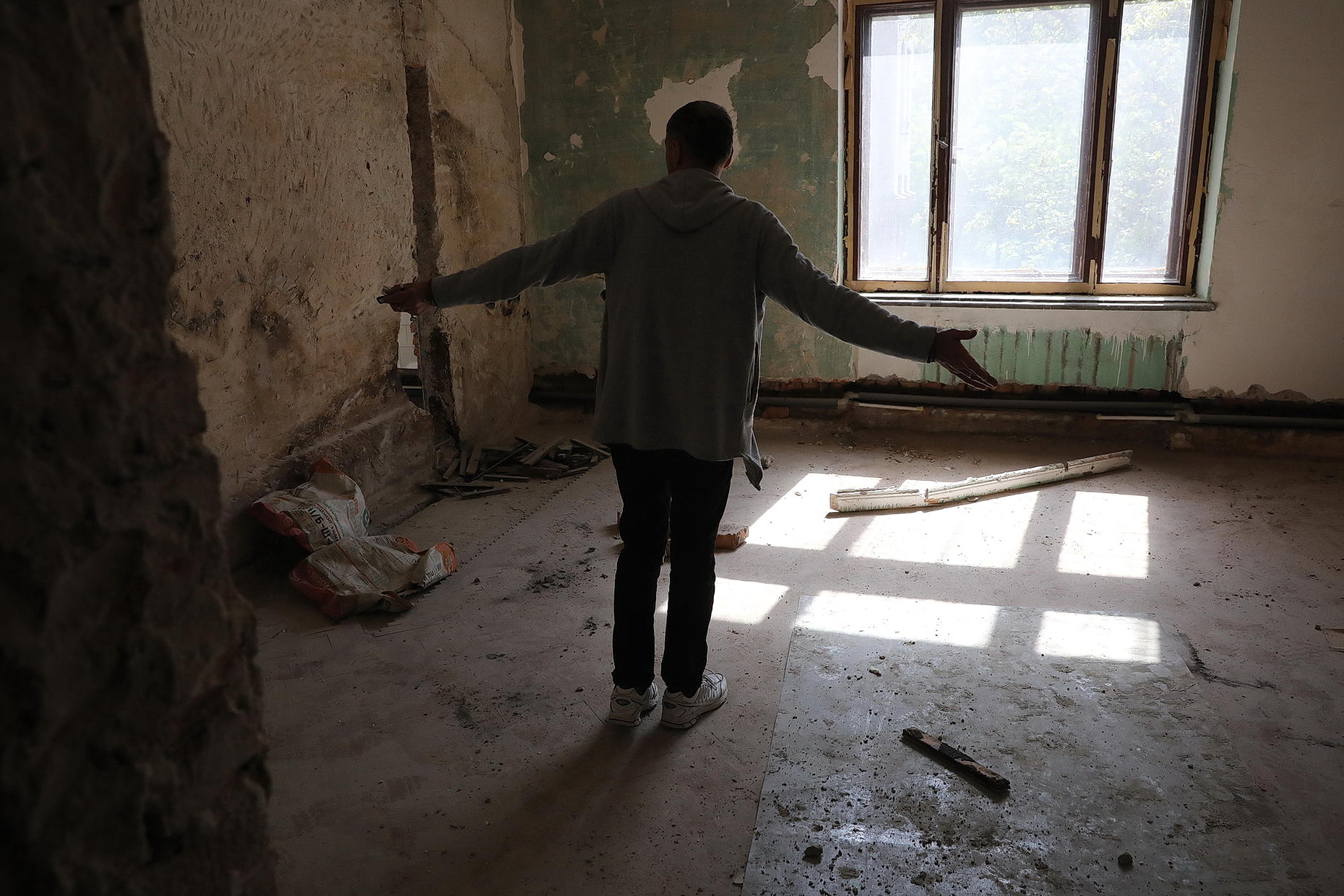 A man stands inside of the Trade Unions House in Odesa on May 13, 2019. The 42 people were killed there by fire on May 2, 2014, following the street fights between the pro-Russian and pro-Ukrainian activists. The total number of those killed on that day from both sides is 48.