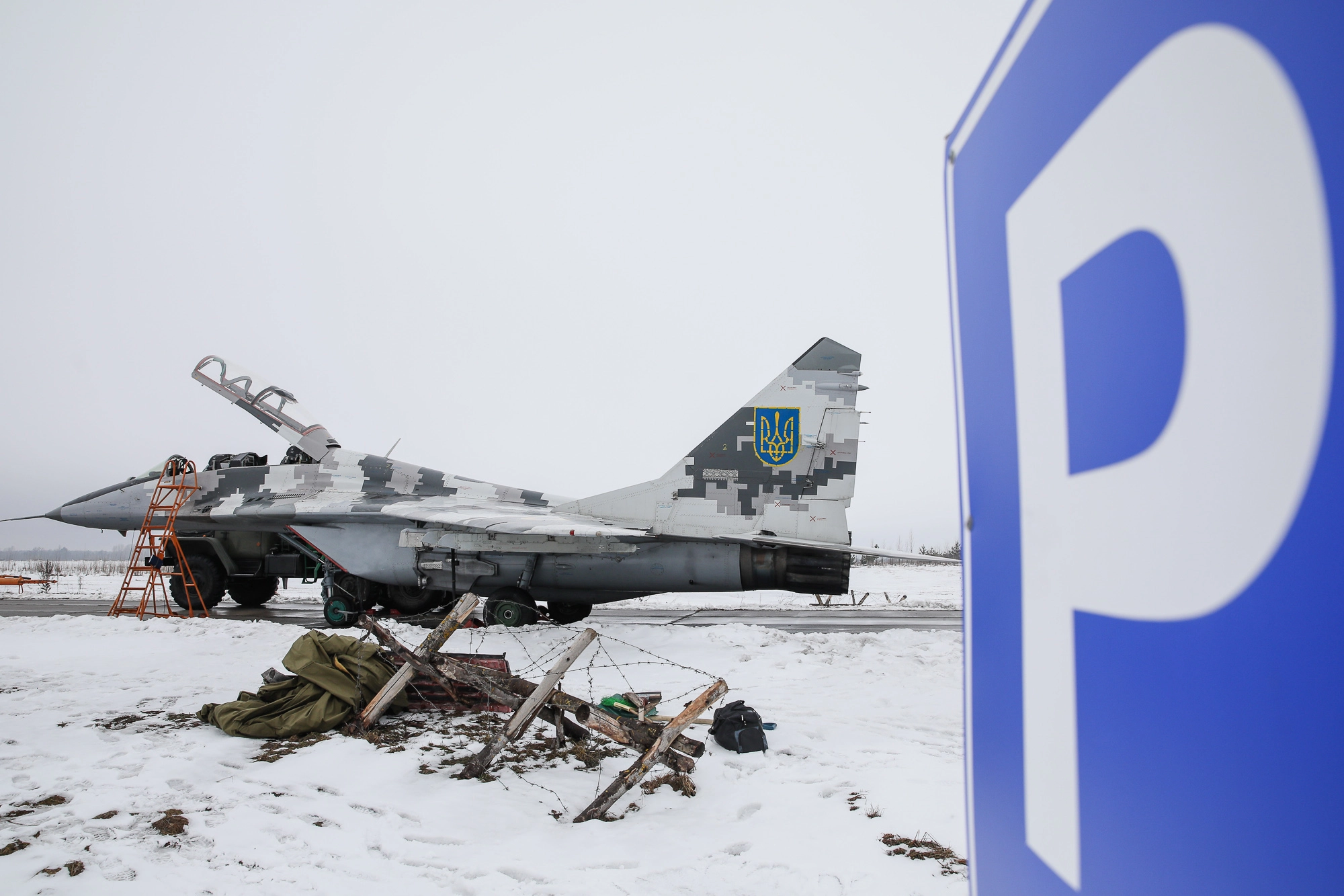 Service technicians prepare a Mikoyan MiG-29 fighter for a practice flight at Repair technicians inspect a Ukrainian Air Force&#8217;s L-39 Albatros training plane at an airbase of Vasylkiv on Feb. 14, 2019.