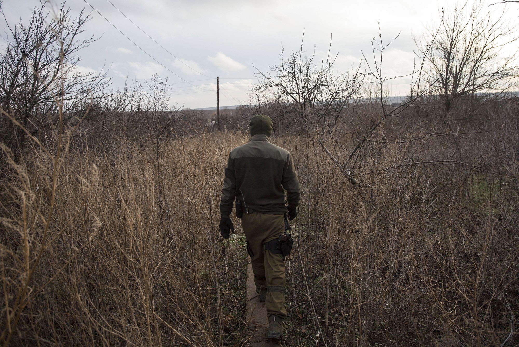 A Ukrainian soldier walks in Verkhniotoretske, Donetsk Oblast on Nov. 29, 2016.