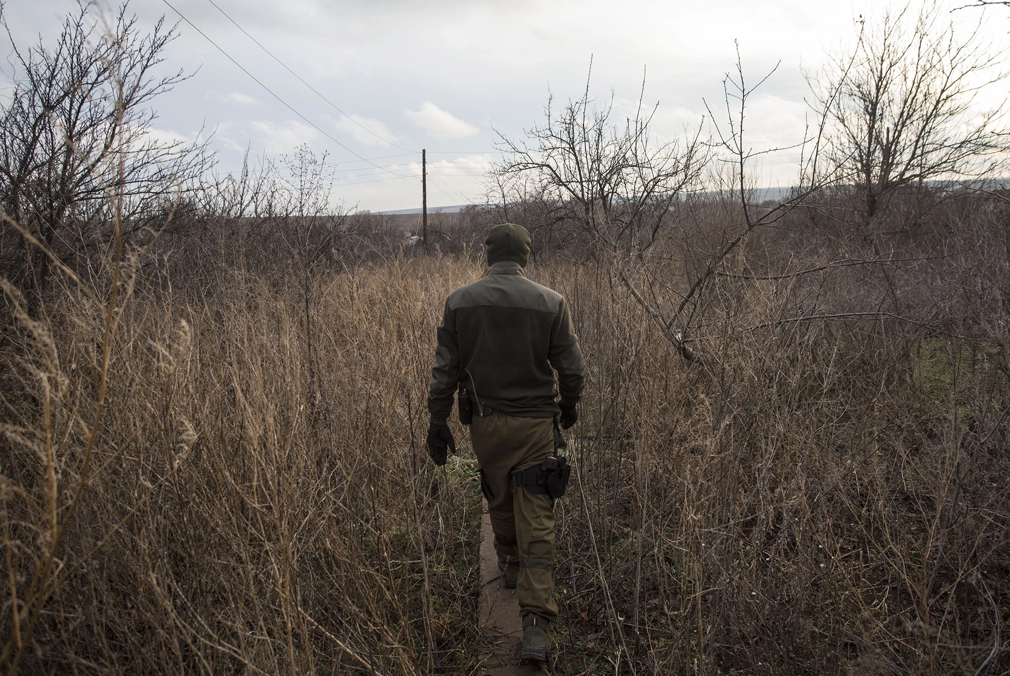 A Ukrainian soldier walks in Verkhniotoretske, Donetsk Oblast on Nov. 29, 2016.