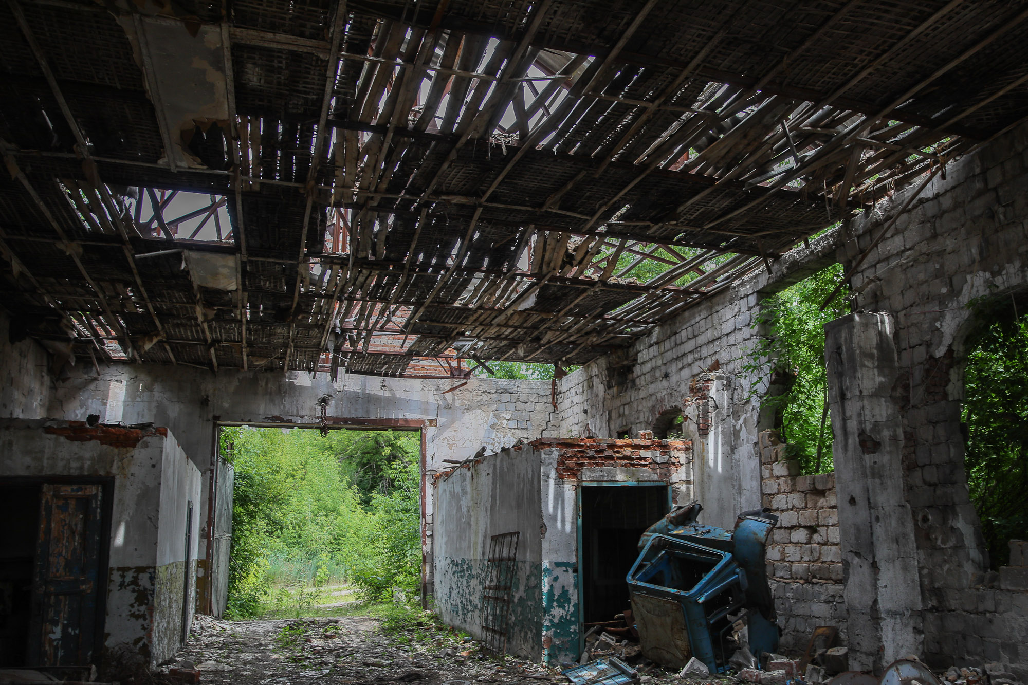 Ruins of an agricultural manufacture building destroyed in shelling, pictured in the town of Opytne, eastern Ukraine, on June 12, 2019.