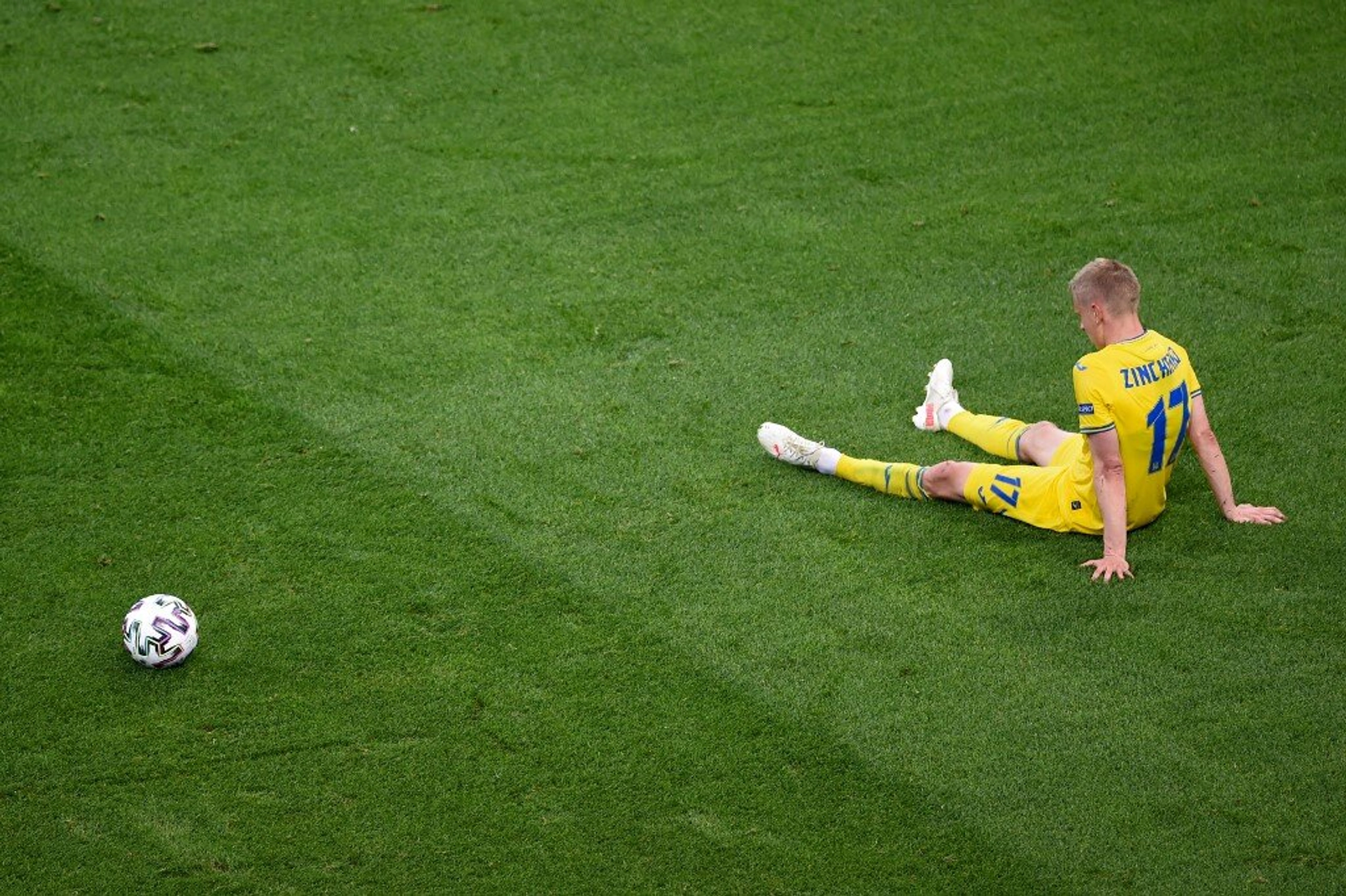 Ukraine&#8217;s defender Oleksandr Zinchenko reacts after losing the UEFA EURO 2020 Group C football match between Ukraine and Austria at the National Arena in Bucharest on June 21, 2021. 