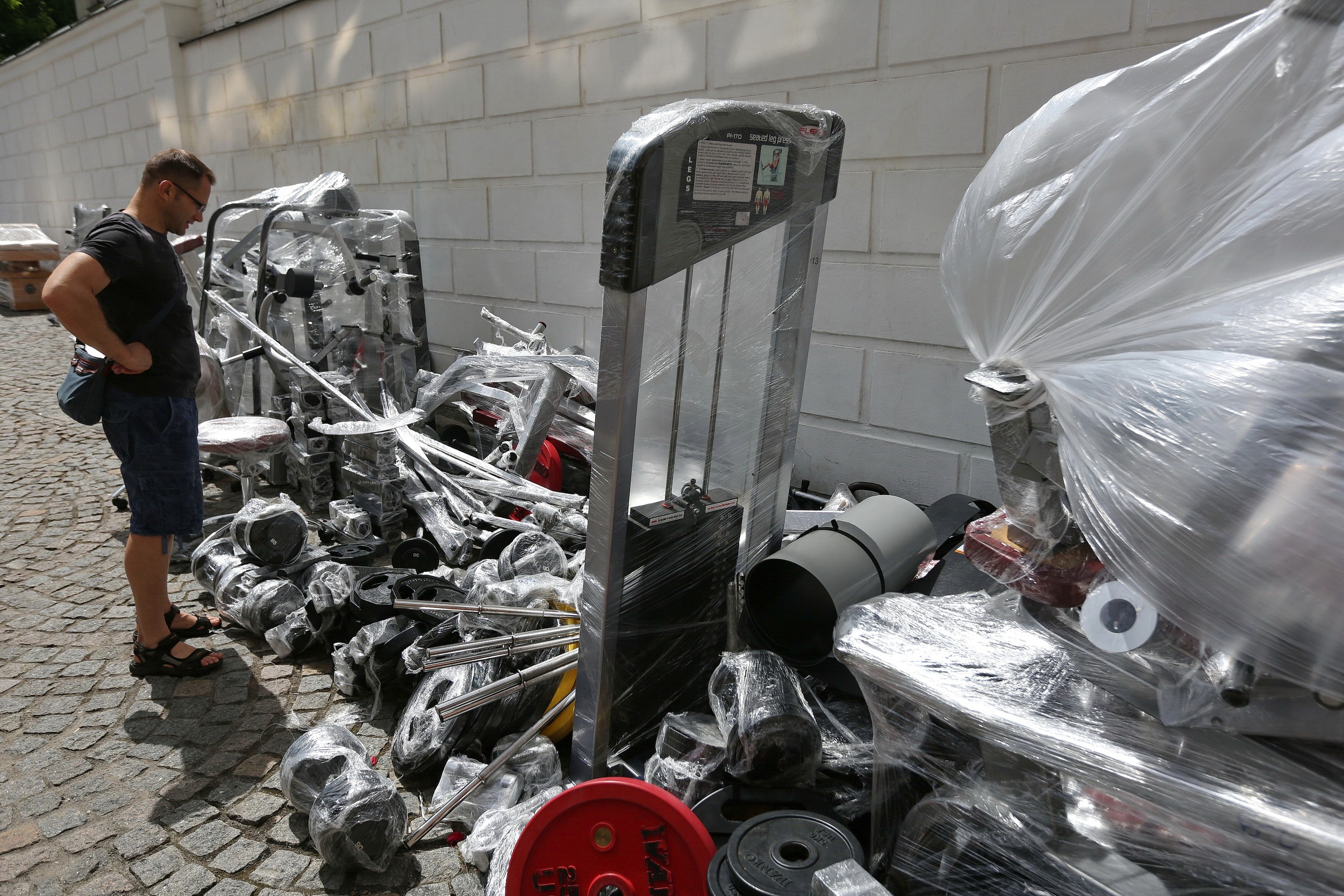 Gym equipment lies dumped on the back terrace of Sofiyskiy Fitness Center in Kyiv on June 13.