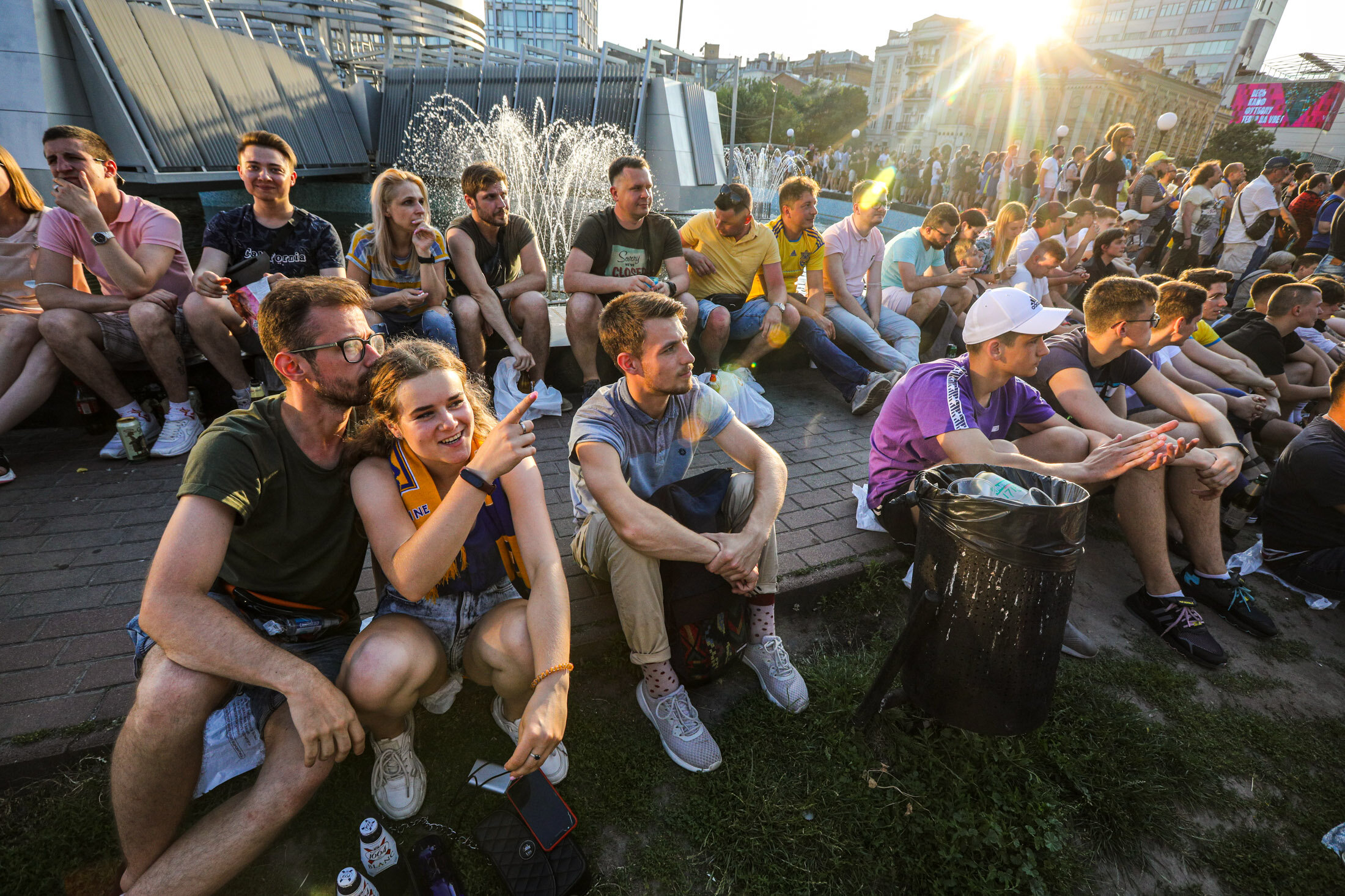 Ukrainian supporters watch the  UEFA EURO 2020 Group C football match between Ukraine and Austria on a giant screen in the center of Kyiv on June 21, 2021.