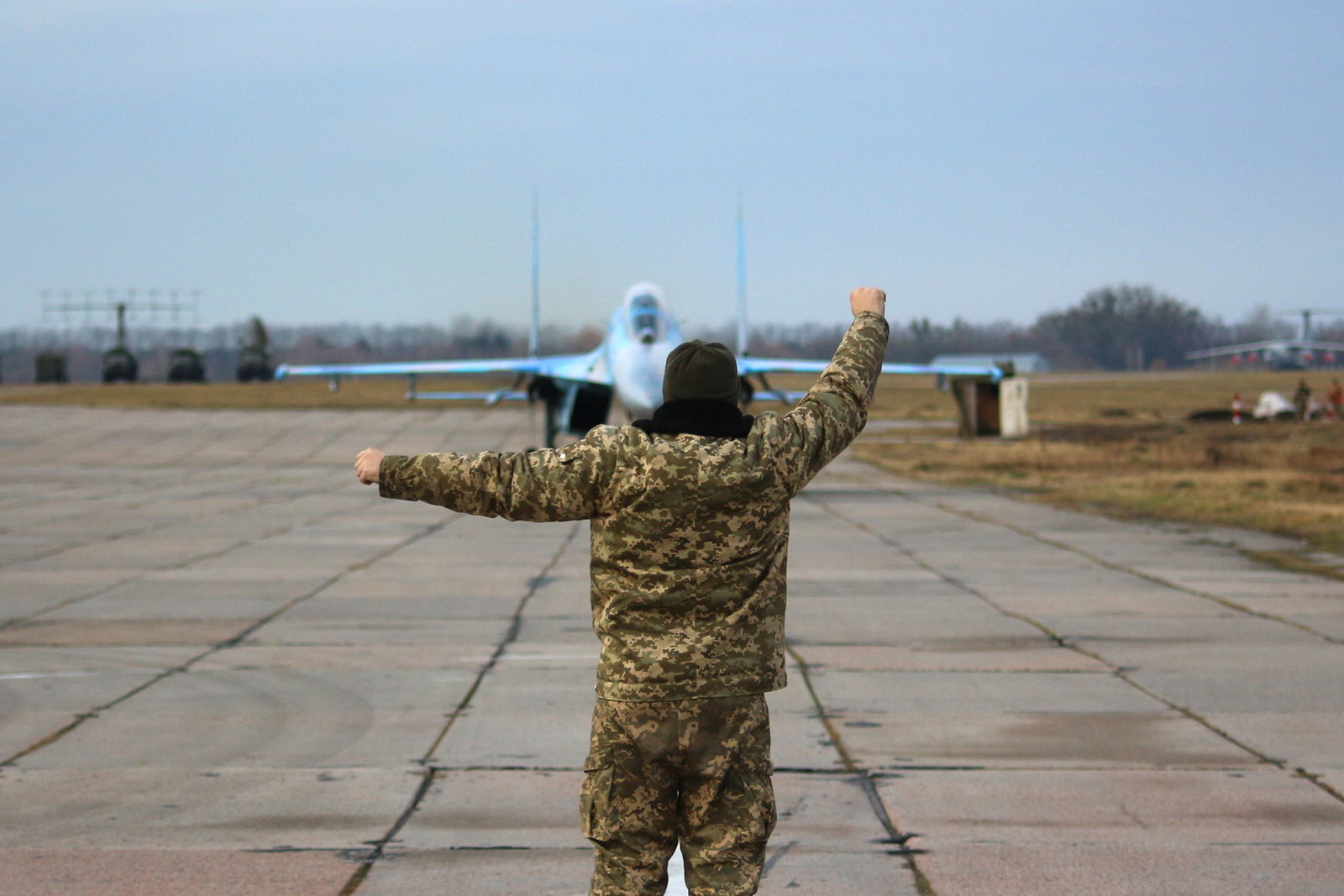 A Ukrainian military officer handles the runway strip traffic at an Air Force base on Jan 11, 2018.