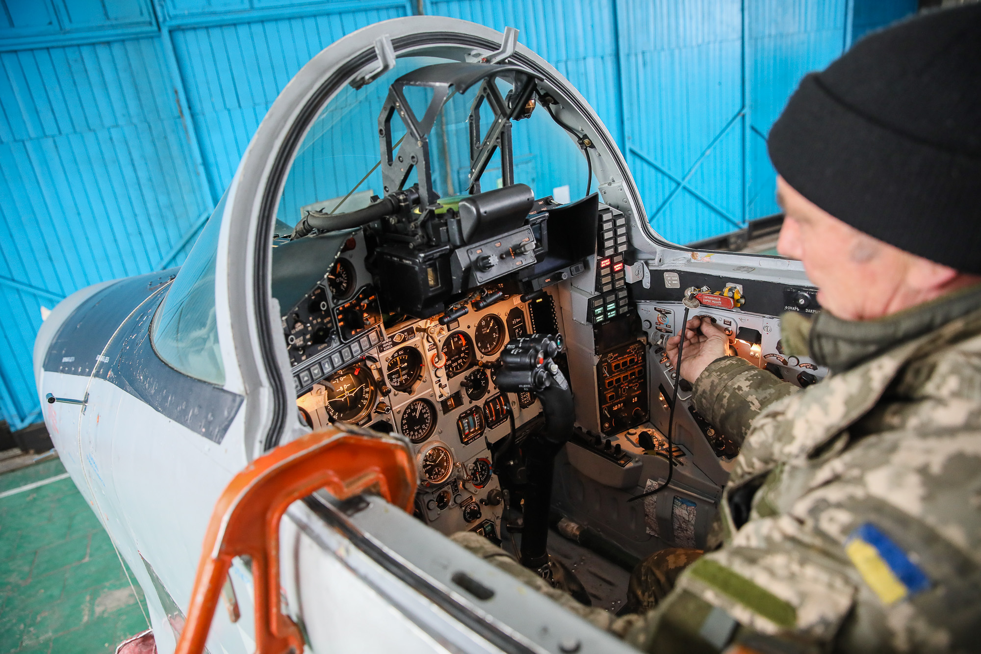 Repair technicians inspect a Ukrainian Air Force&#8217;s Mikoyan MiG-29 ighter at an airbase of Vasylkiv on Feb. 14, 2019.