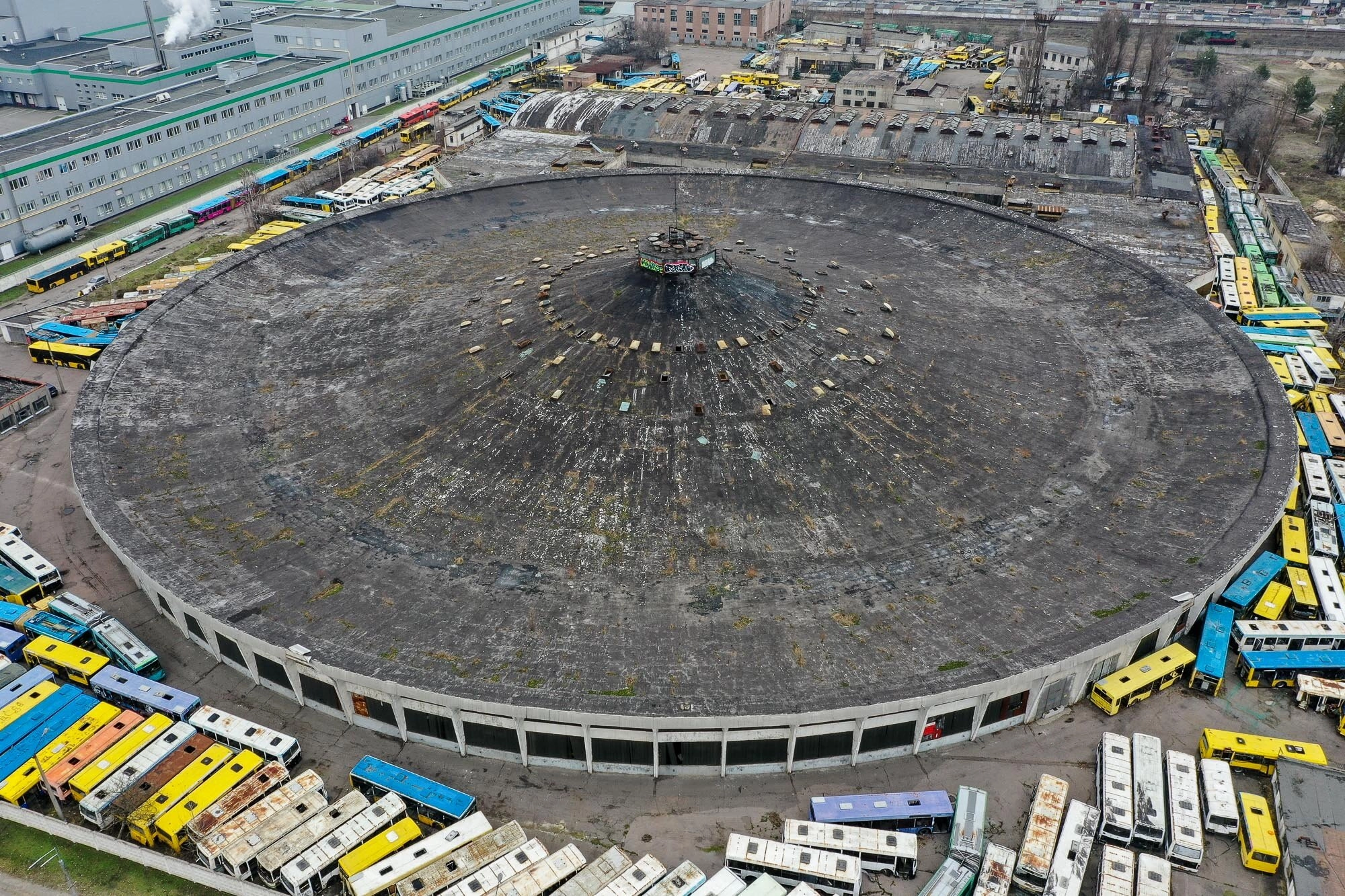 The abandoned Bus Depot #7 is located on the outskirts of Kyiv near the Chervonyi Khutir metro station.