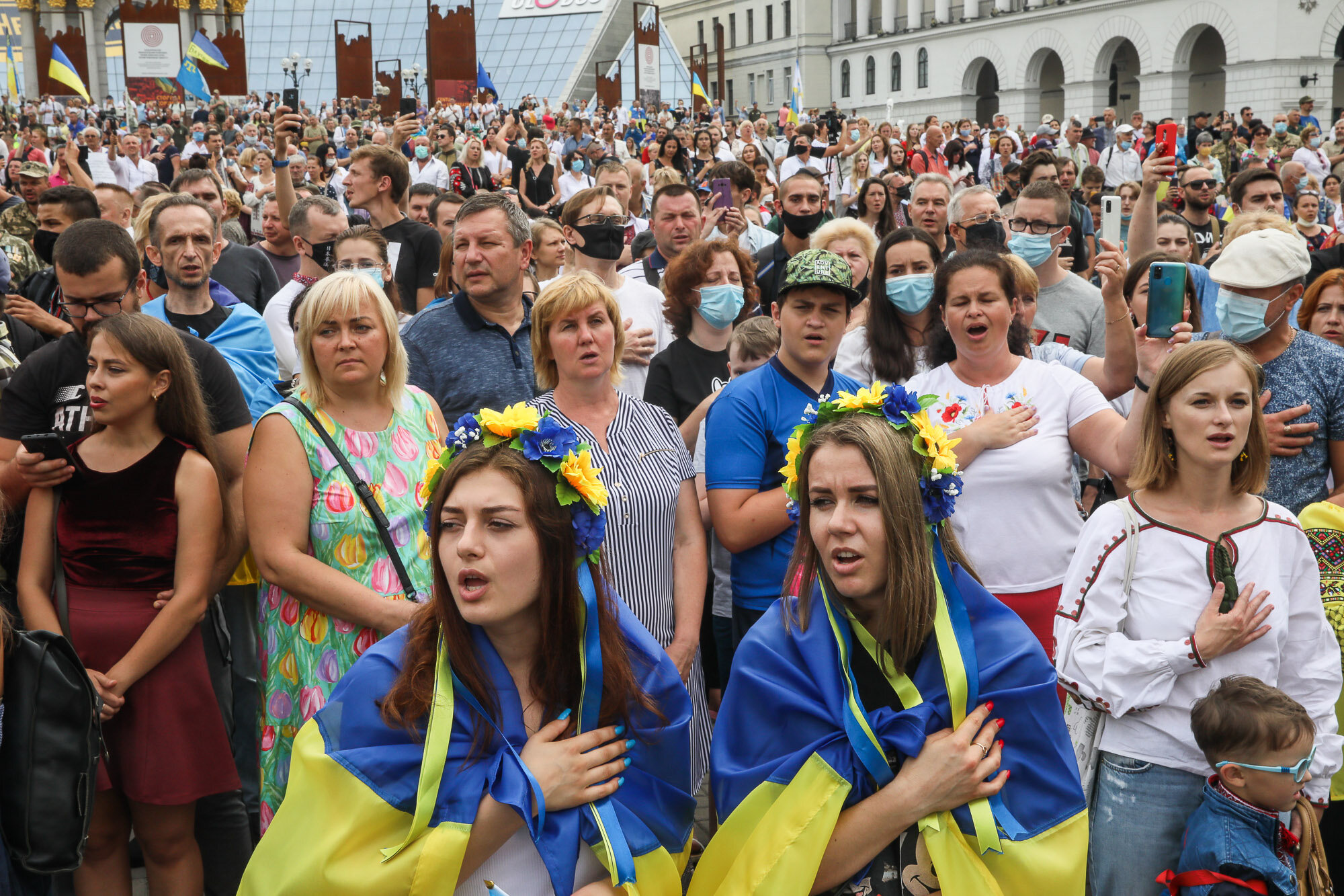People sing Ukraine’s national anthem after the March of Defenders of Ukraine, an event that celebrated Ukraine&#8217;s Independence Day in Kyiv on Aug. 24, 2020.