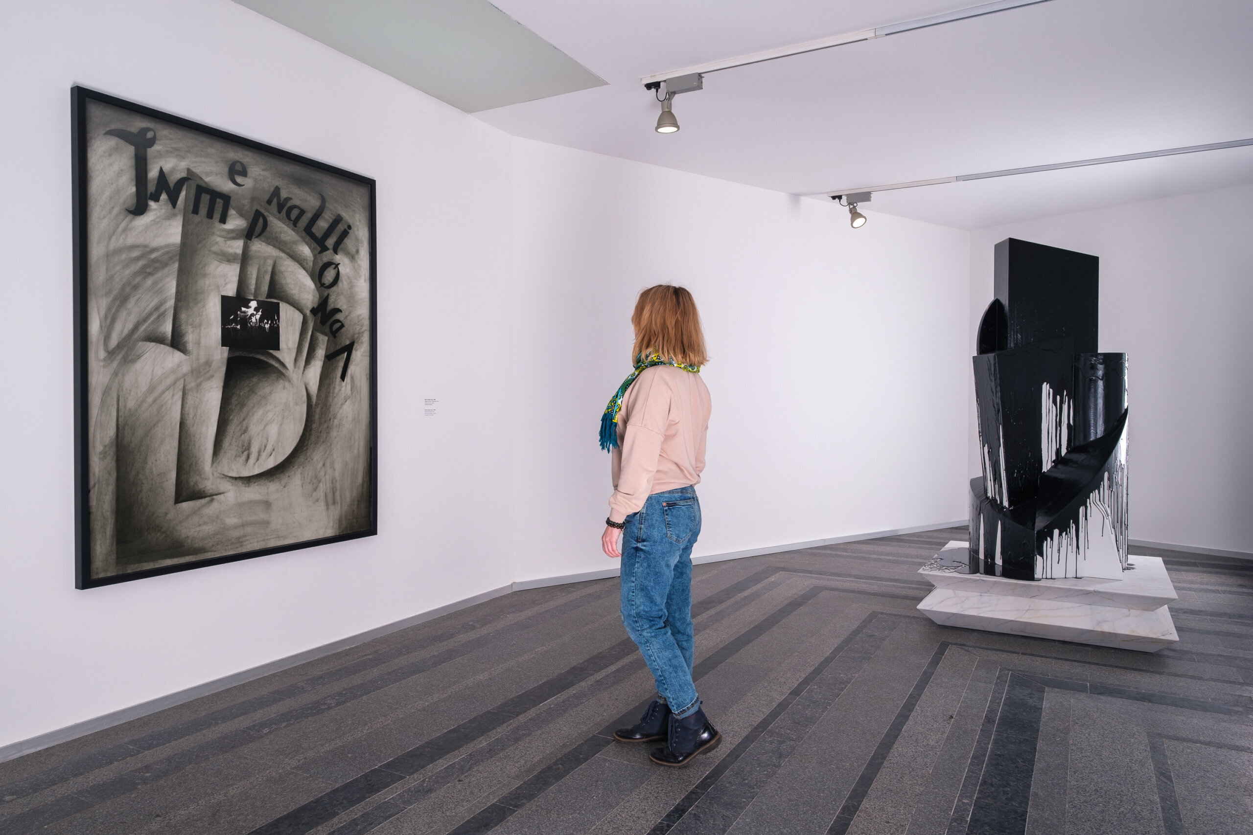 A woman explores Nikita Kadan’s latest “Stone Hits Stone” exhibition at Pinchuk Art Center in Kyiv downtown.