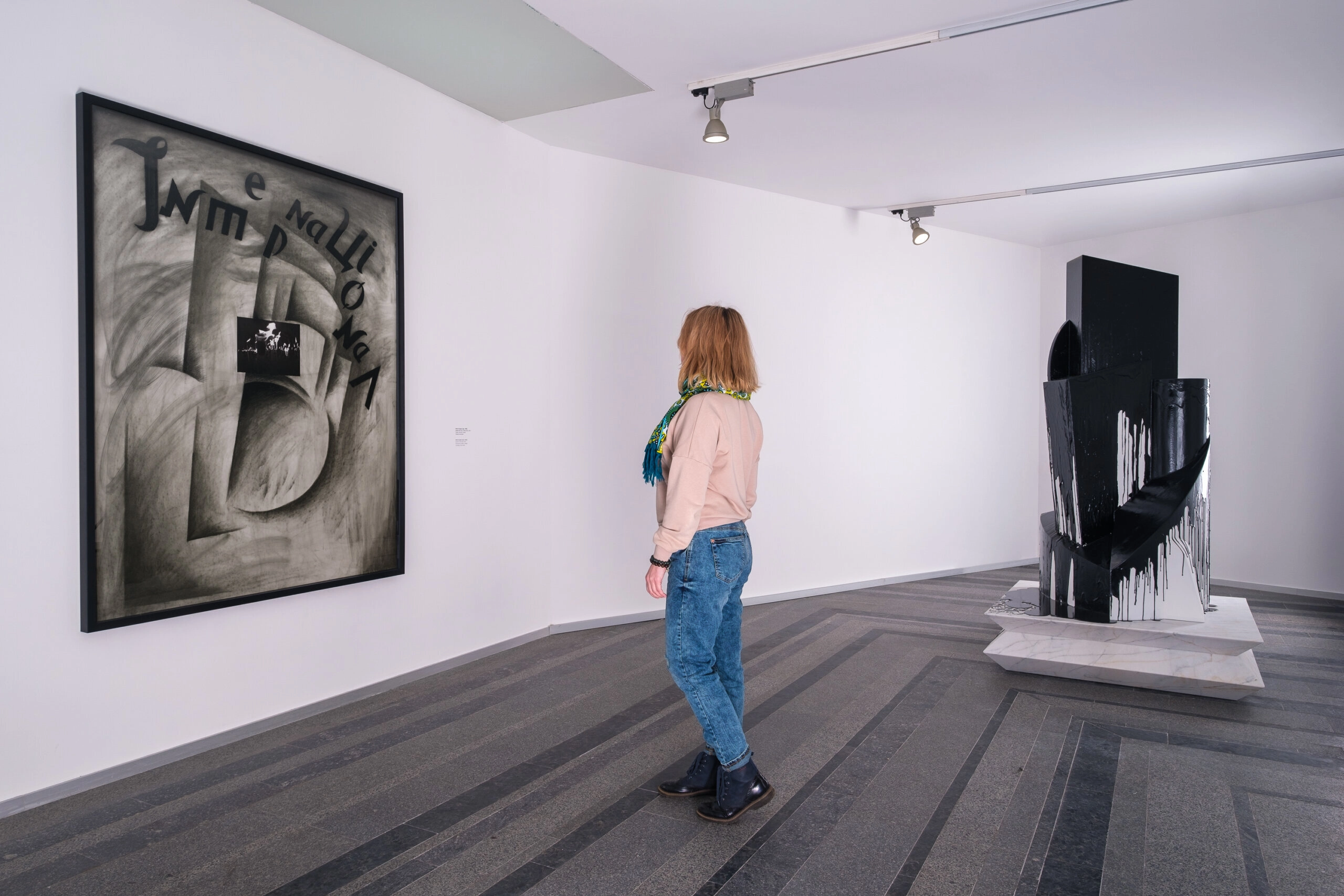 A woman explores Nikita Kadan’s latest “Stone Hits Stone” exhibition at Pinchuk Art Center in Kyiv downtown.