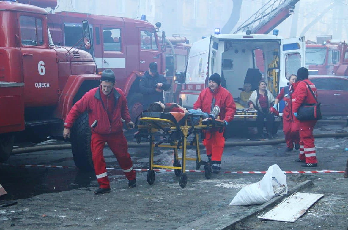 Paramedics rescue victims of the fire in central Odesa on Dec. 4, 2019