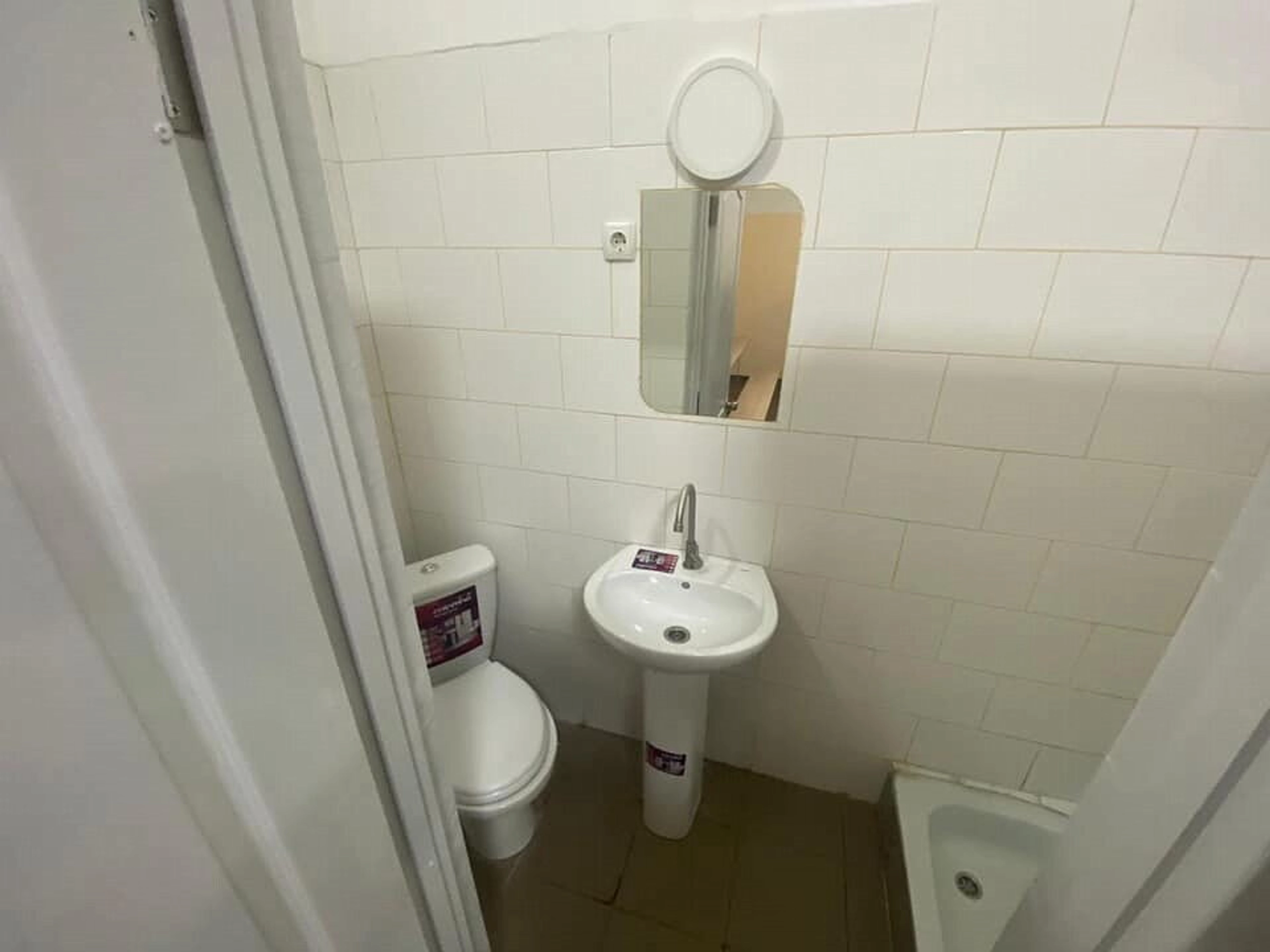 A bathroom in a renovated cell at the Lukyanivske pre-trial detention center in Kyiv. The Ukrainian Justice Ministry invested nearly $2,390 to buy new furniture, remove mold from the cell&#8217;s walls and paint them.