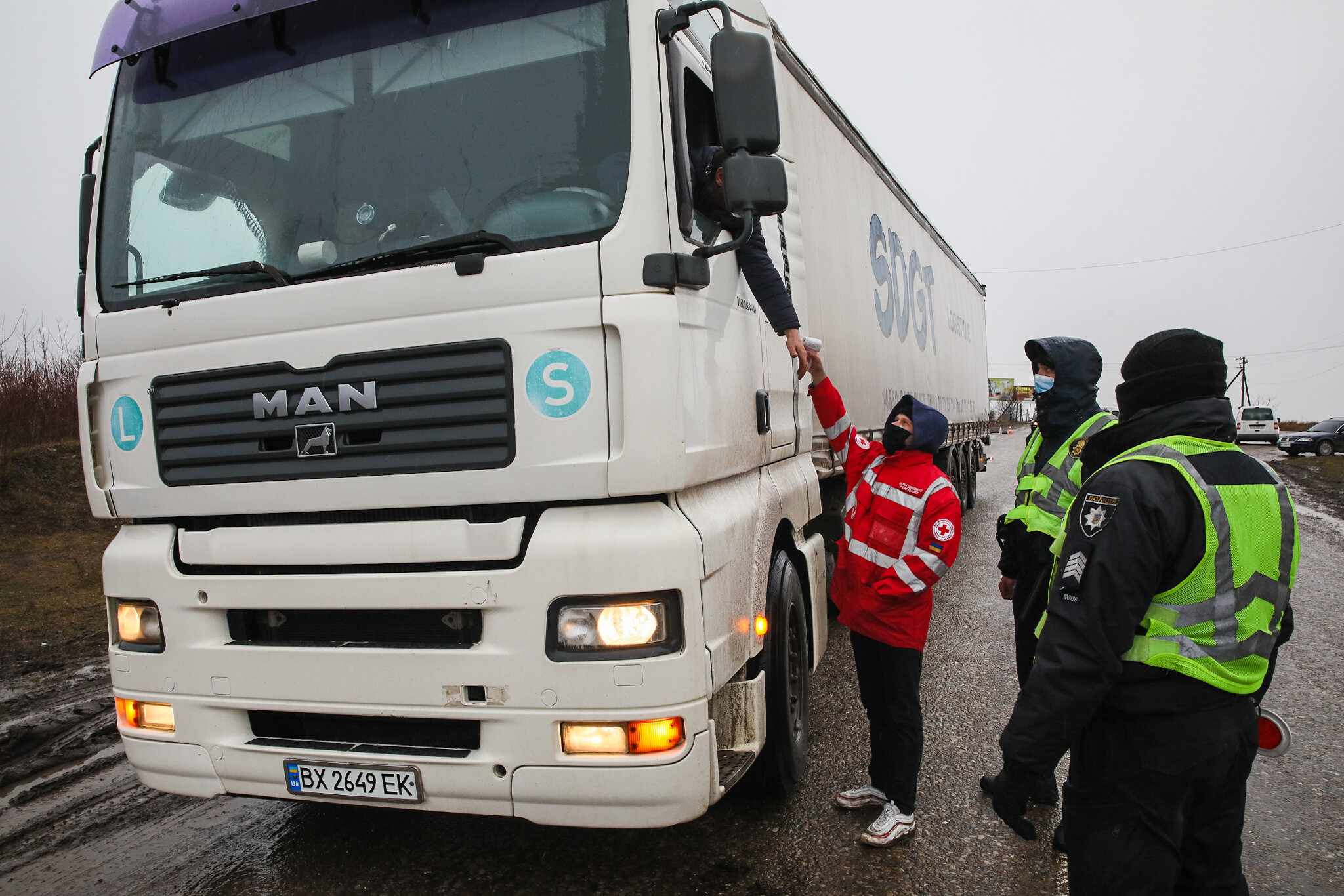 A truck stops at one of the checkpoints in Ivano-Frankivsk Oblast on Feb. 26, 2021. In March alone, 1,155 new commercial vehicles like trucks, vans and buses were sold in Ukraine — twice more than last March.