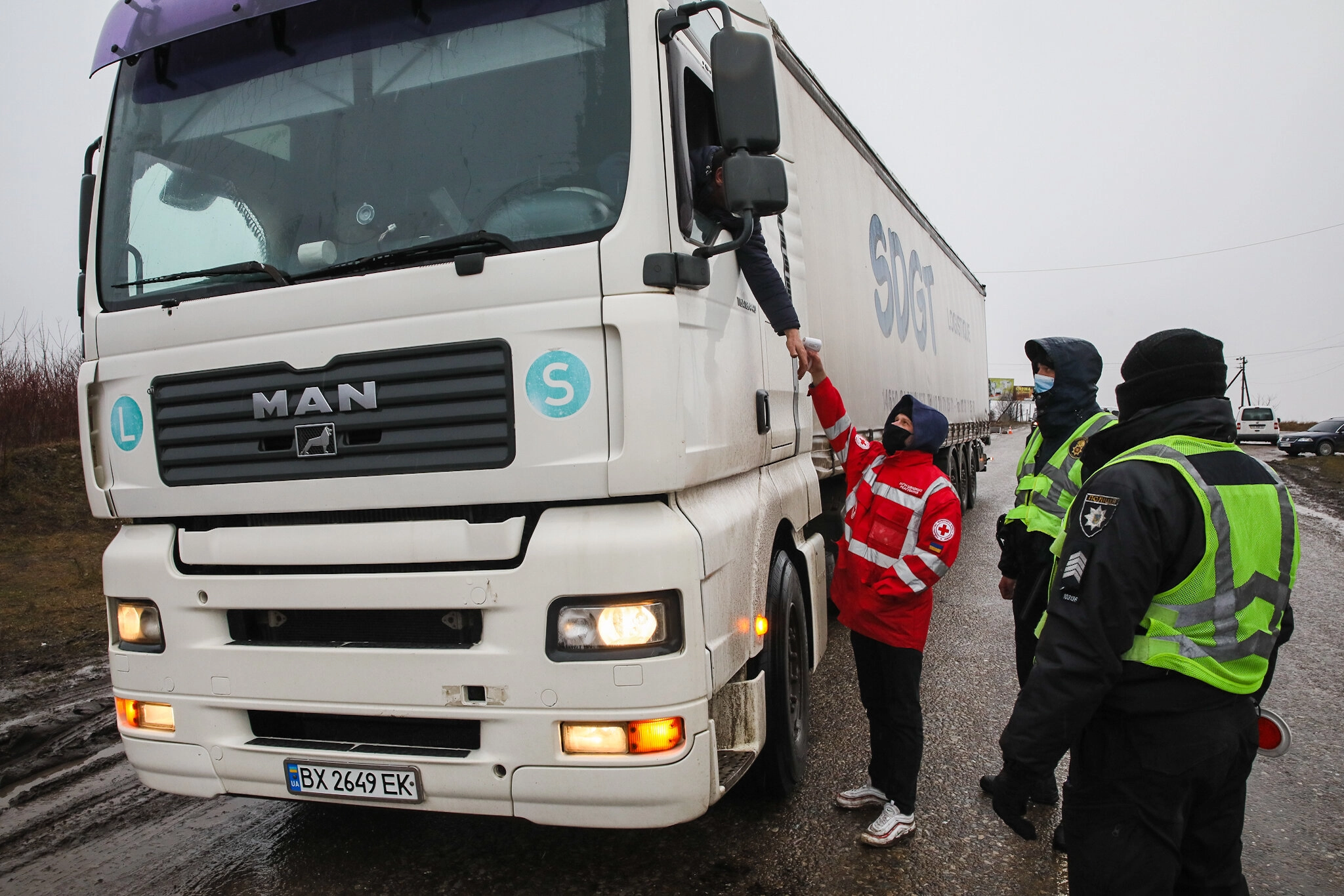 A truck stops at one of the checkpoints in Ivano-Frankivsk Oblast on Feb. 26, 2021. In March alone, 1,155 new commercial vehicles like trucks, vans and buses were sold in Ukraine — twice more than last March.