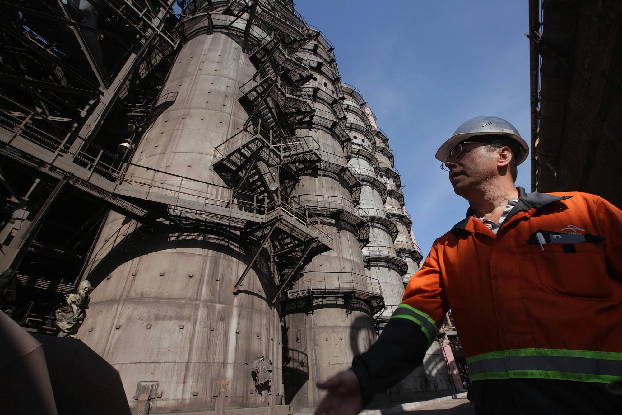 A worker looks out at a coking plant built in 2013 at ArcelorMittal Kryvyi Rih, constructed as a part of the company&#8217;s strategy to modernize the steel mill. 