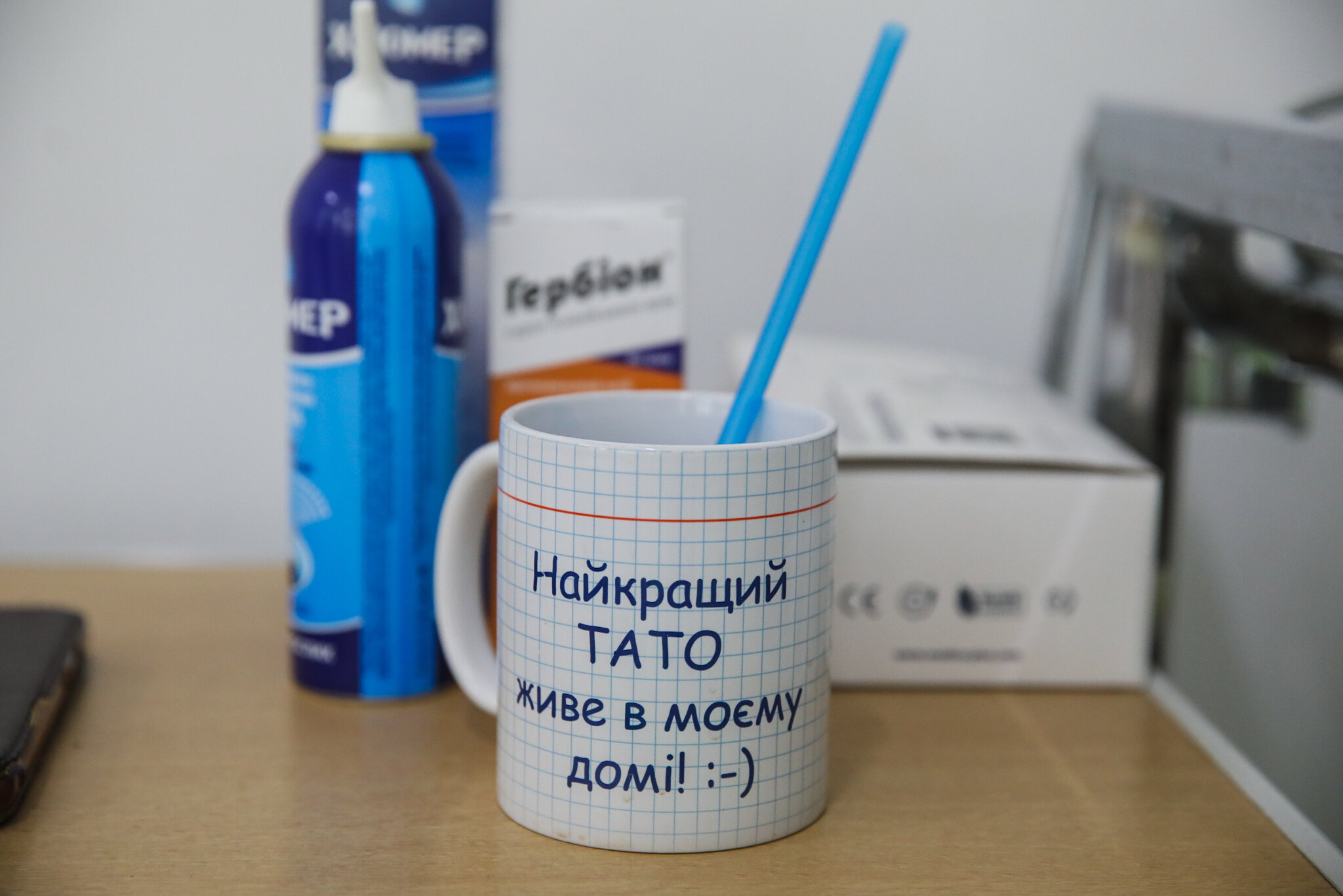 A mug labeled “The Best Dad” sits on the table next to Taras Biyovsky, a coronavirus patient in intensive care unit at Kolomyia District Hospital in Ivano-Frankivsk Oblast on March 16, 2021. Biyovskiy has five children.